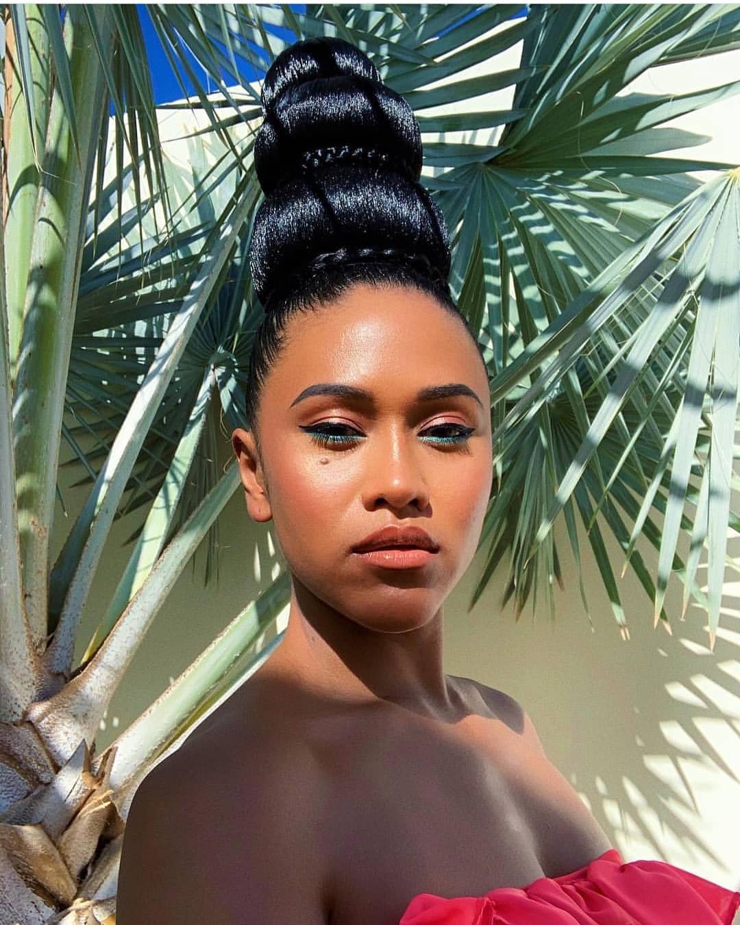 15. Elevated Elegance: the Sculpted Bun with Braided Detail