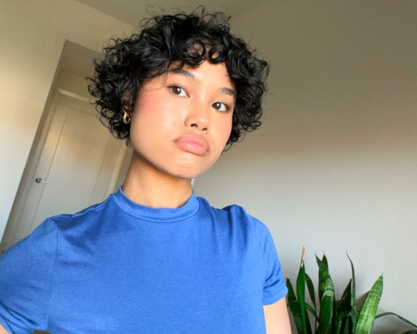 19. Curls with an Attitude: Embrace the Bouncy Bangs Revolution