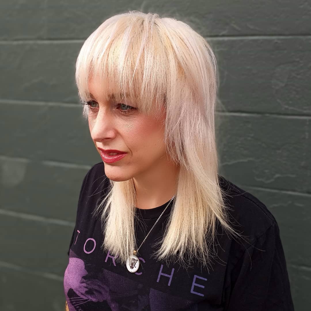 11. Fringe Of Future: Embrace the Bold with Textured Platinum Locks