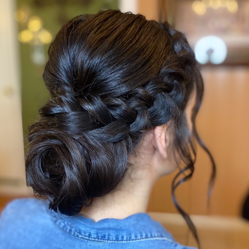 1. Braided Elegance: an Exquisite Chignon with Textured Personality