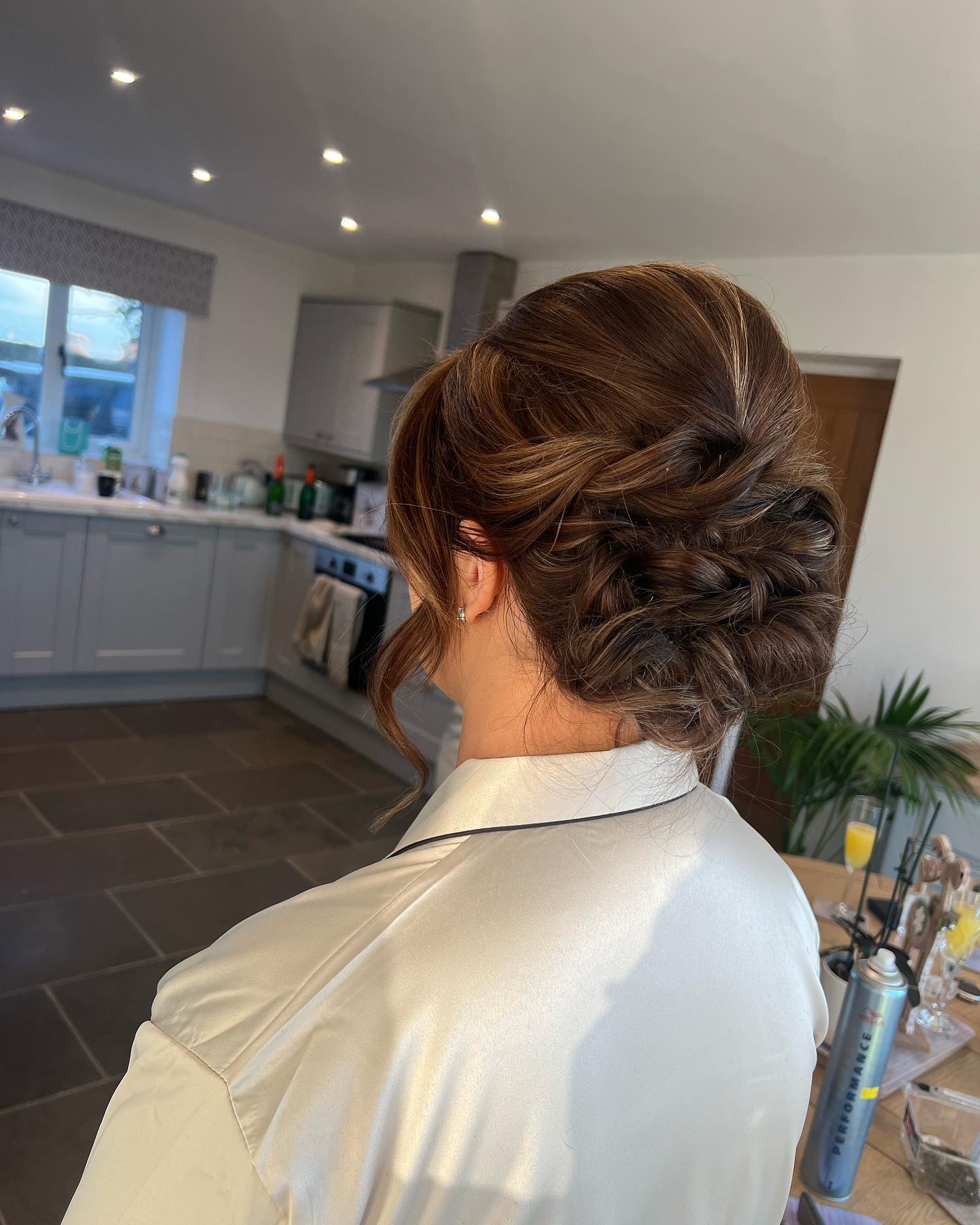 28. Twisted Elegance: a Braided Bun for the Modern Bridesmaid