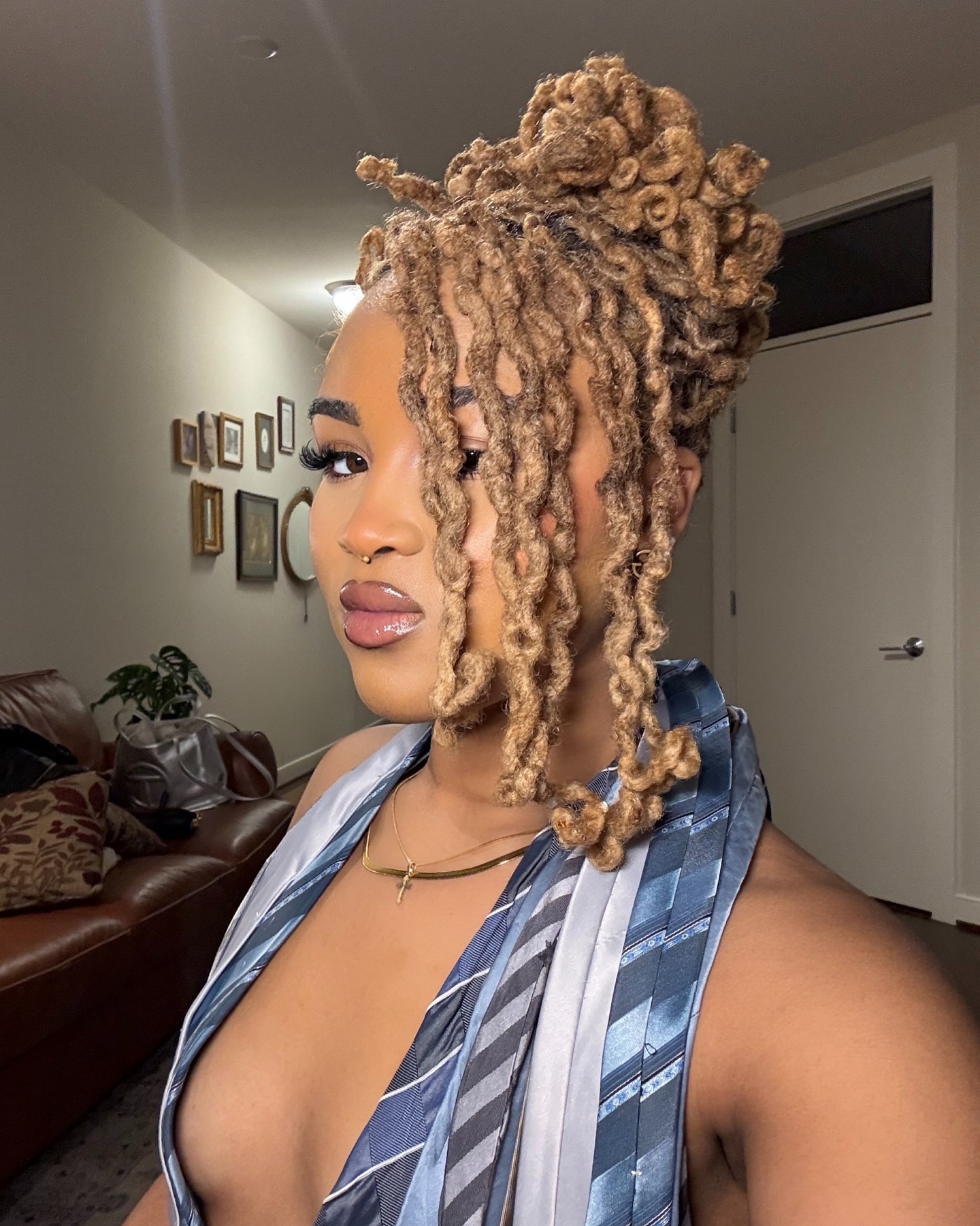 42. Crowned Curlicues: a Whimsical Twist on Short Locs