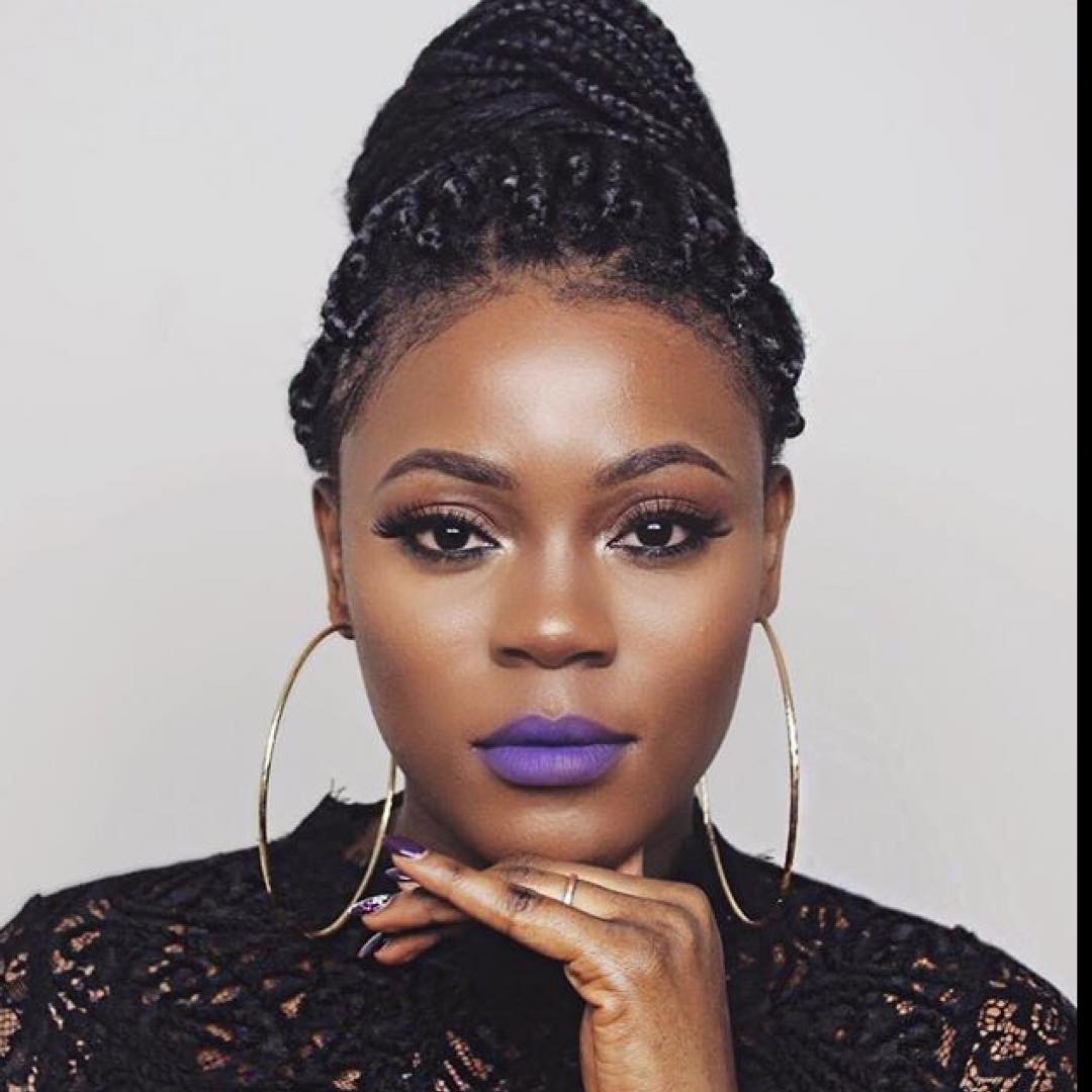 20. Crown Of Elegance: an Elevated Braided Topknot for Prom Glam