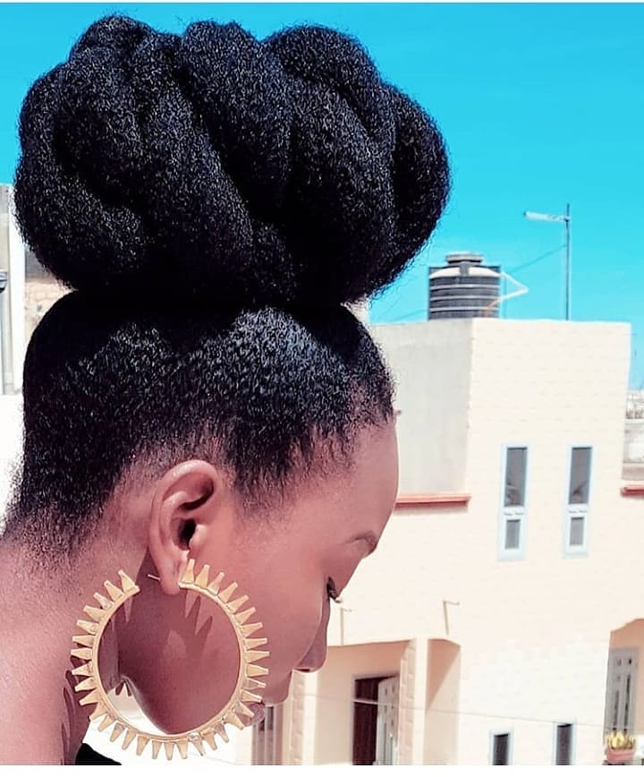 1. Crowning Glory: a Sculpted Top Knot with a Twist