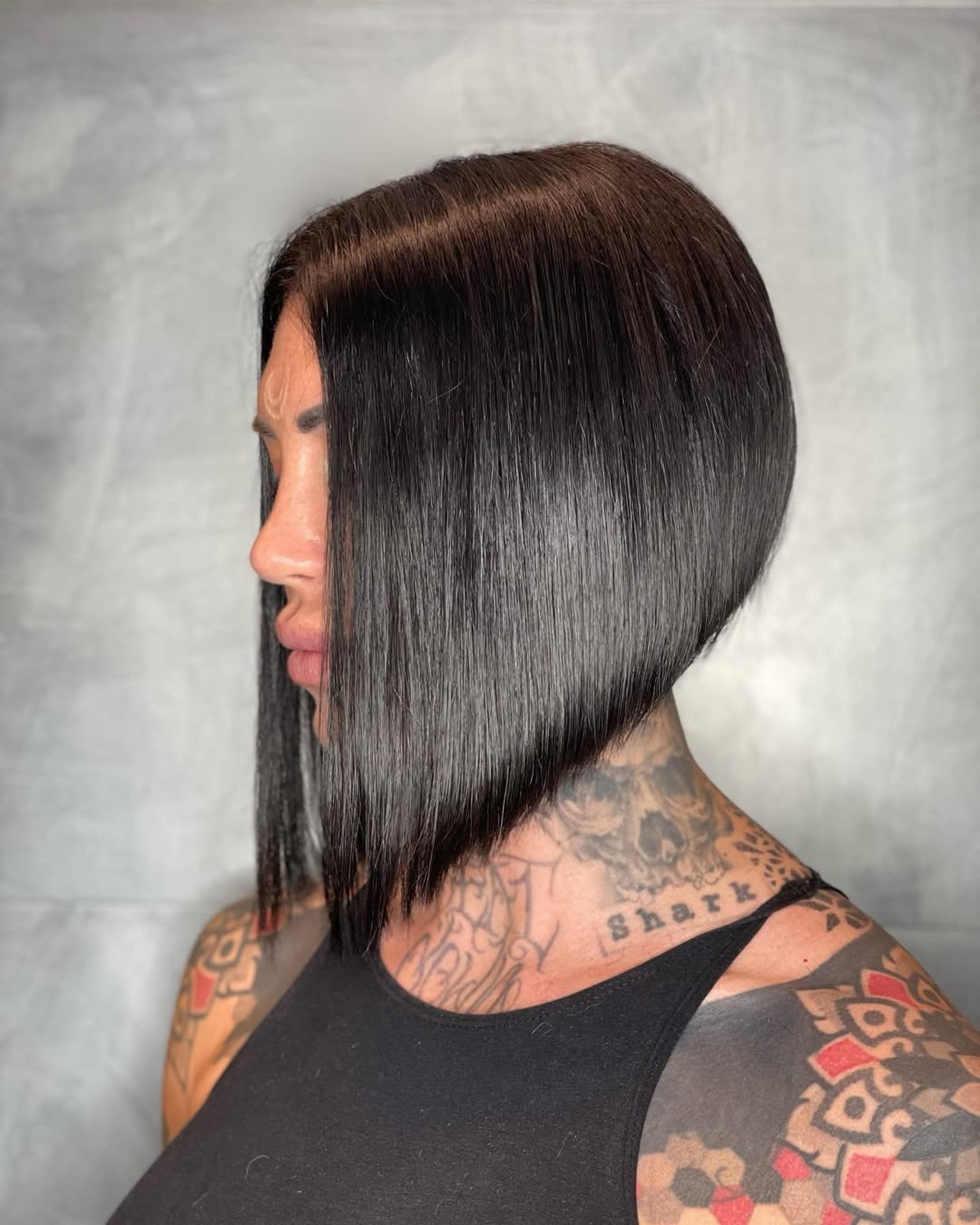 35. Asymmetrical Long Bob with Sleek Finish