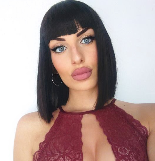 2. Blunt Bob with Side Bangs