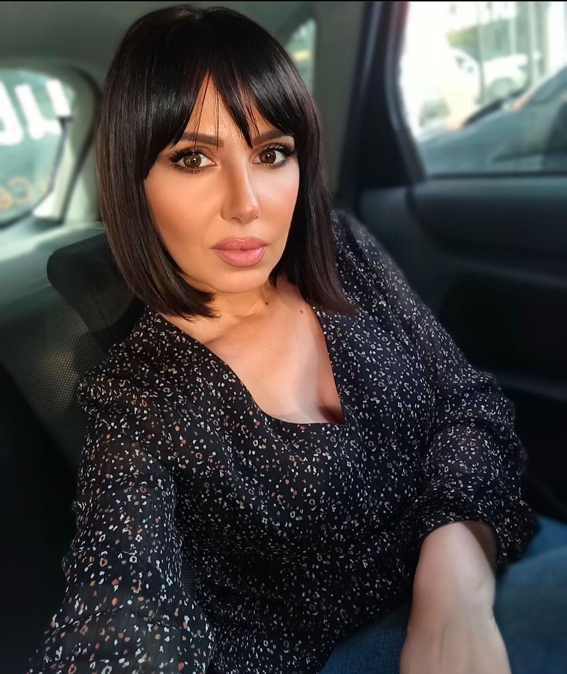 32. Modern Blunt Bob with Fringe