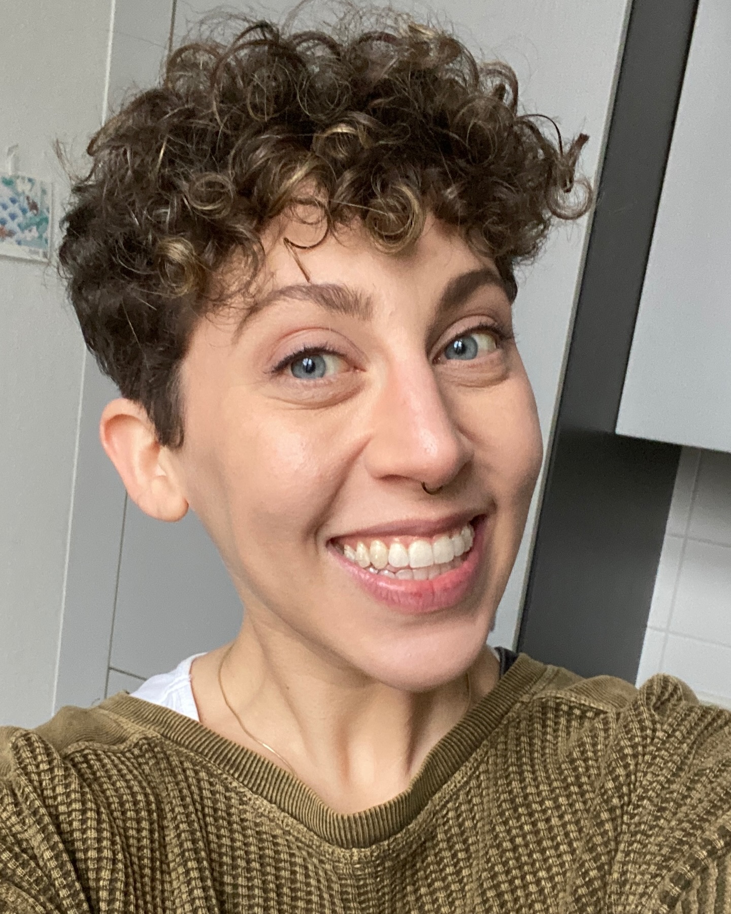 41. Curls with Character: Embrace the Edgy Charm Of Chic Micro-fringes