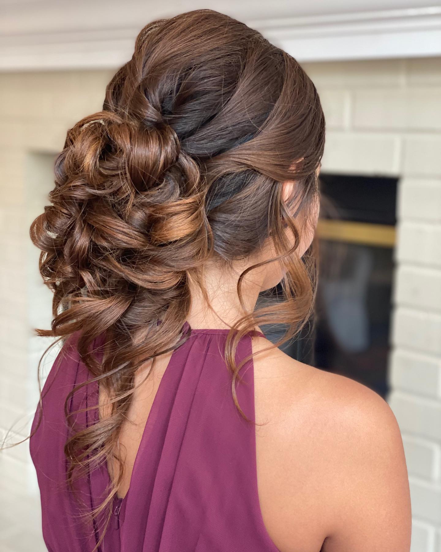 15. Embellished Elegance: a Romantic Boho Updo with Cascading Curls