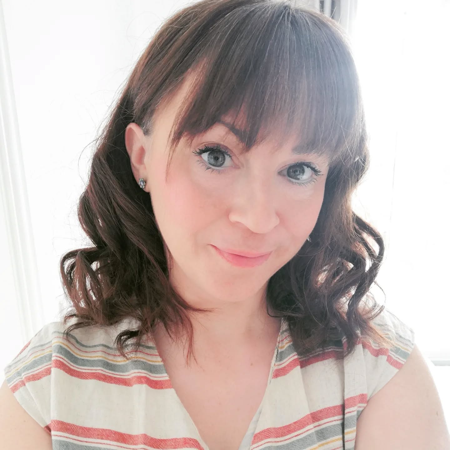 31. the Playful Shag with Wispy Bangs