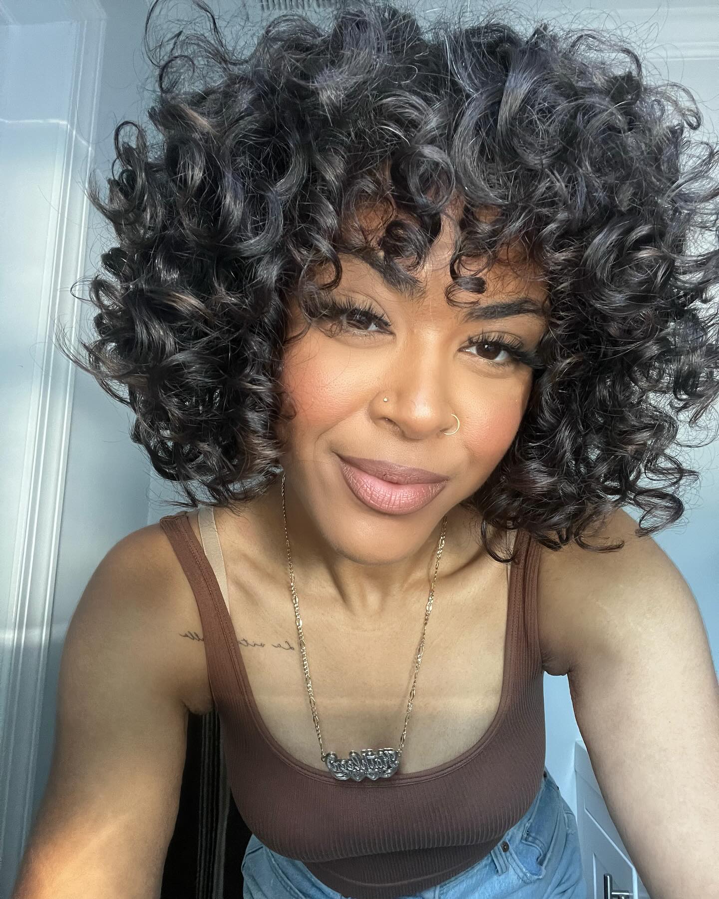 9. Cascading Curly Embrace: the Charming Charm Of Effortless Bounce