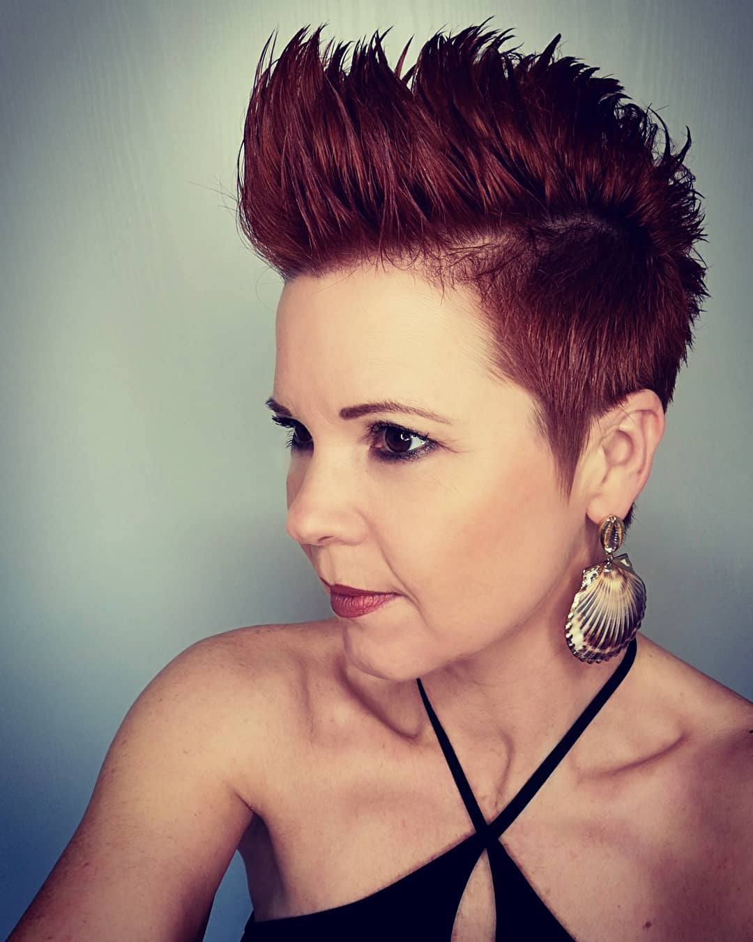 10. Rebellious Radiance: the Bold Pixie with a Fiery Twist