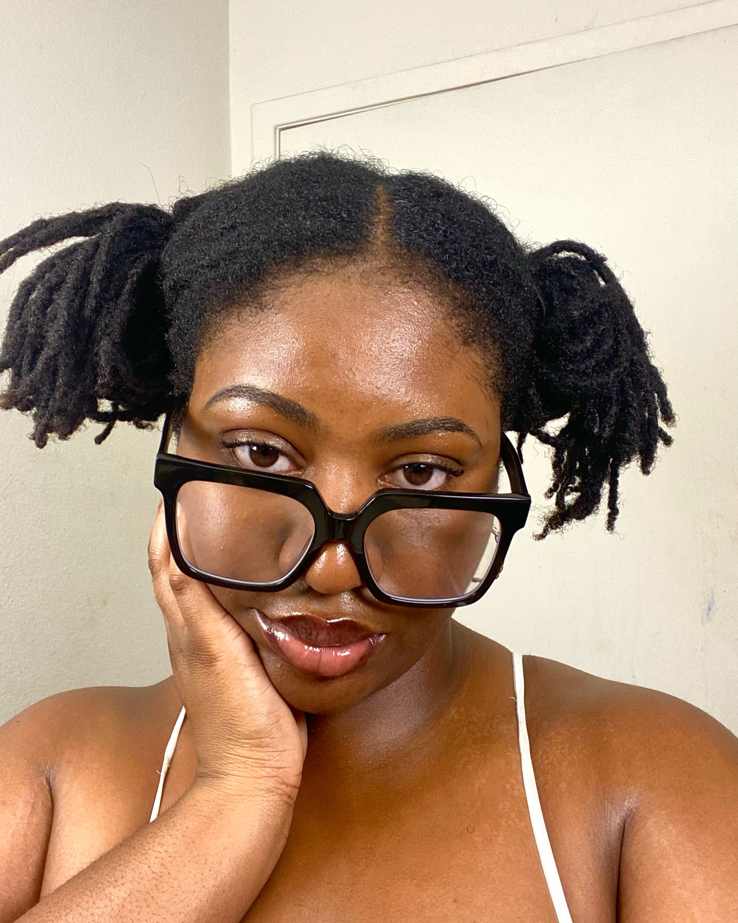 19. Pigtails with a Twist: the Playful Elegance Of Short Locs