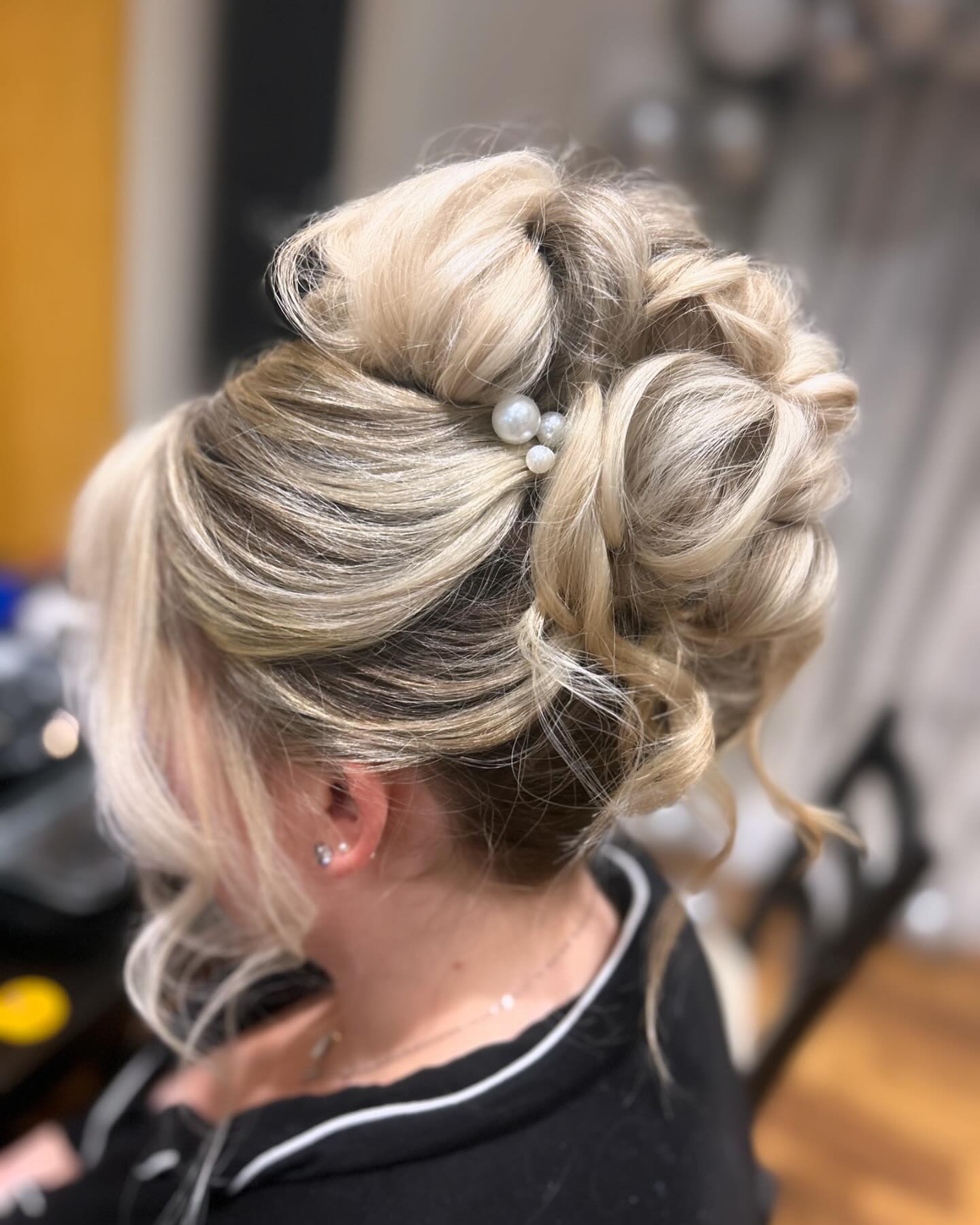 11. the Textured Pearl-embellished Updo