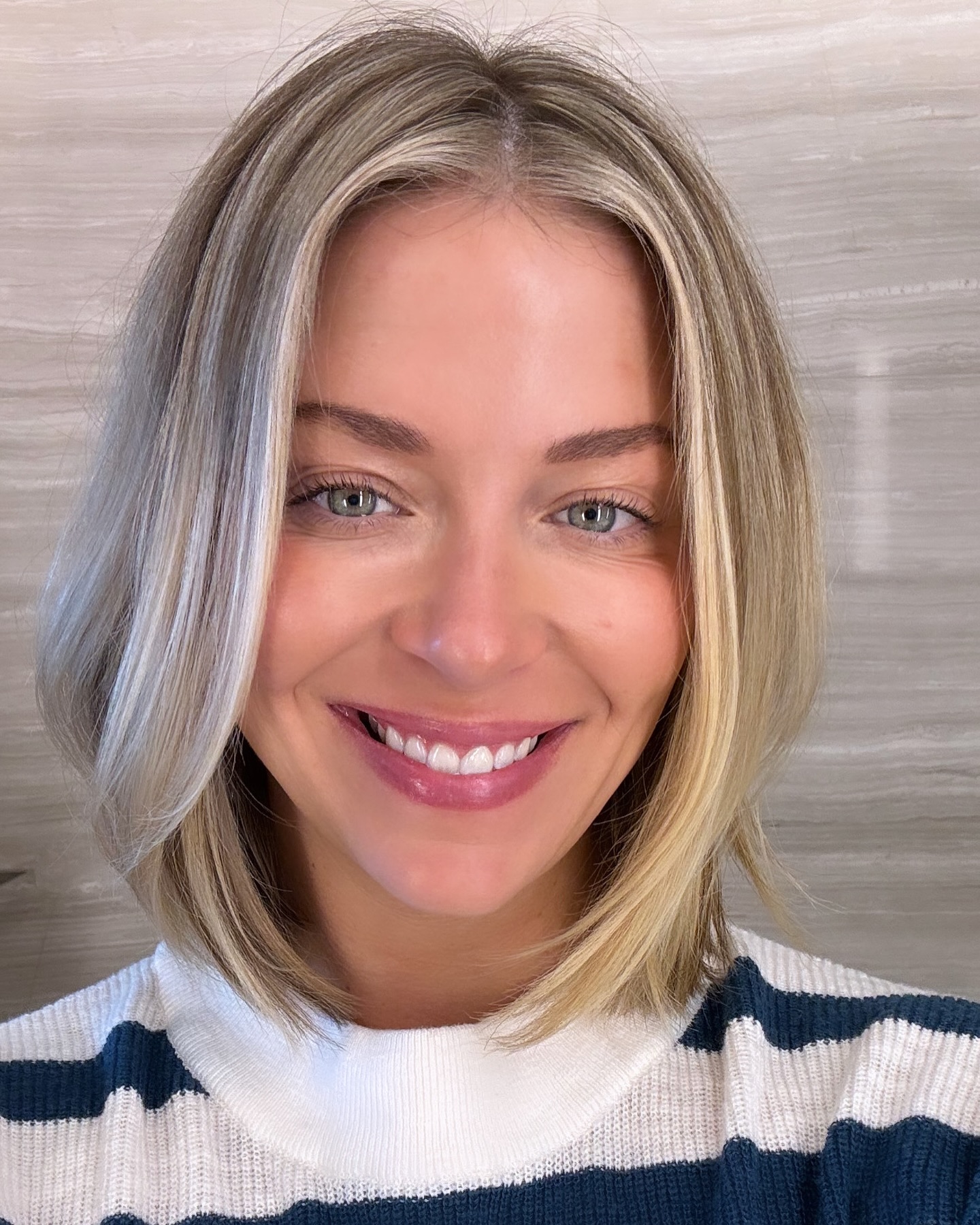 29. Lively Textured Bob with Subtle Highlights