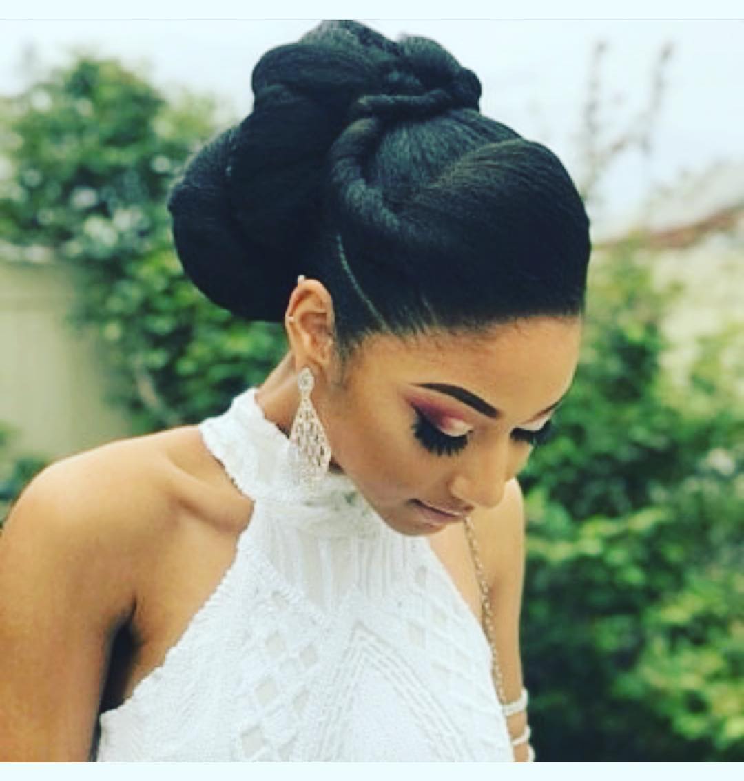 47. Cascading Elegance: an Artful Twist on Timeless Updos