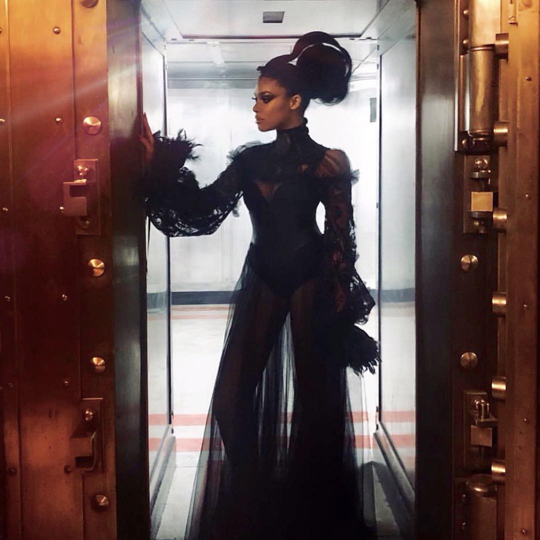 16. Dramatic Elegance: a High-fashion Updo That Dares to Dazzle