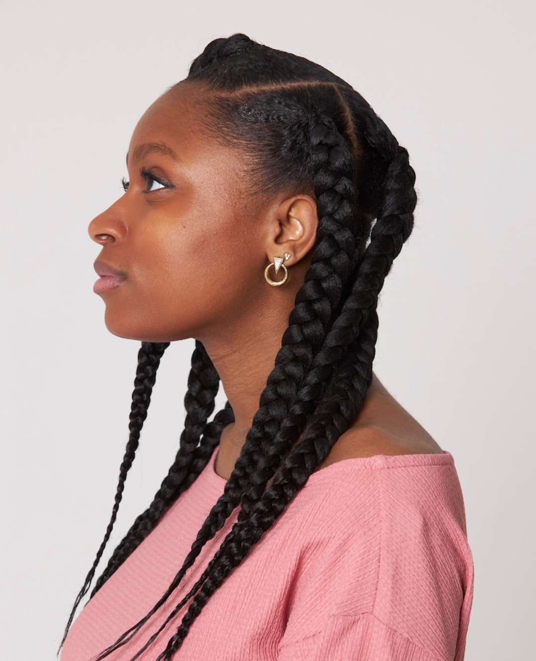 29. Elegant Harmony Of Vertical Box Braids and Chic Side Part