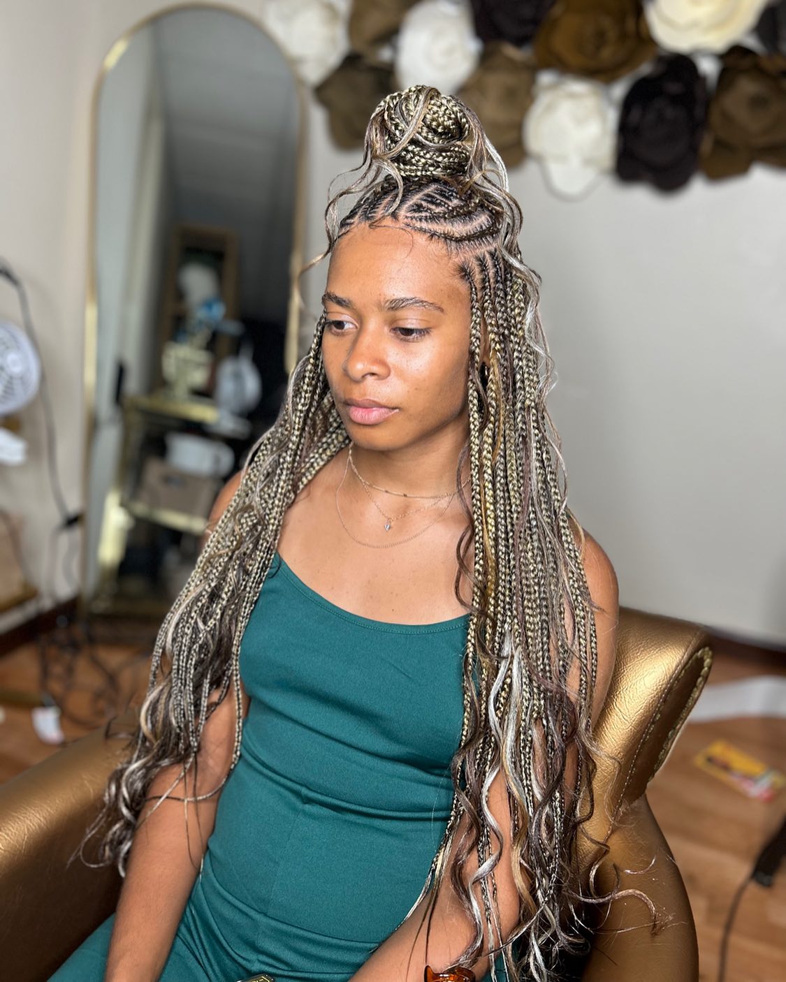 16. Unconventional Elegance: the High Bun Box Braids with a Twist