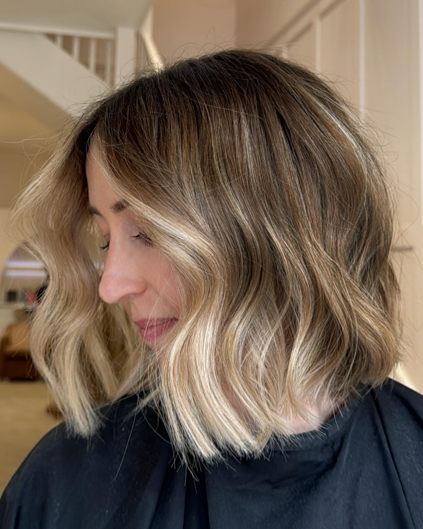 21. Wavy Lob with Balayage Highlights