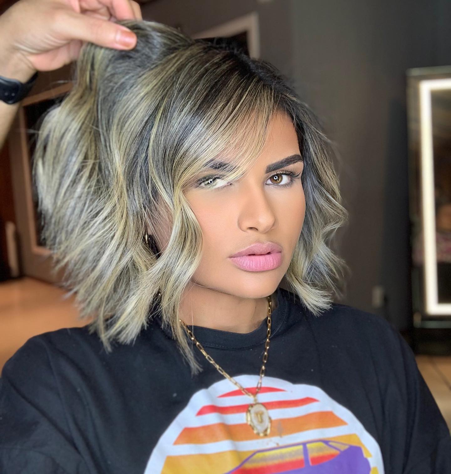 21. the Edgy Bob with Sun-kissed Dimension