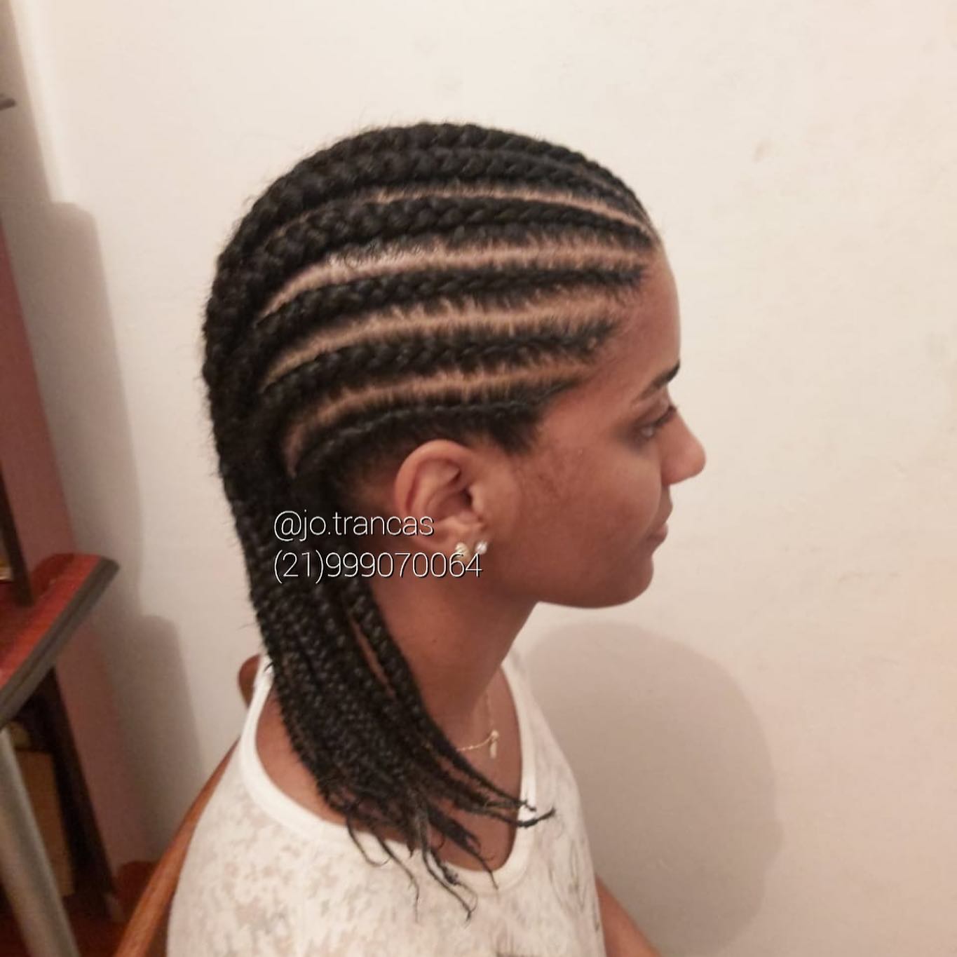 35. Sculpted Elegance: the Artistic Edge Of Side-swept Box Braids