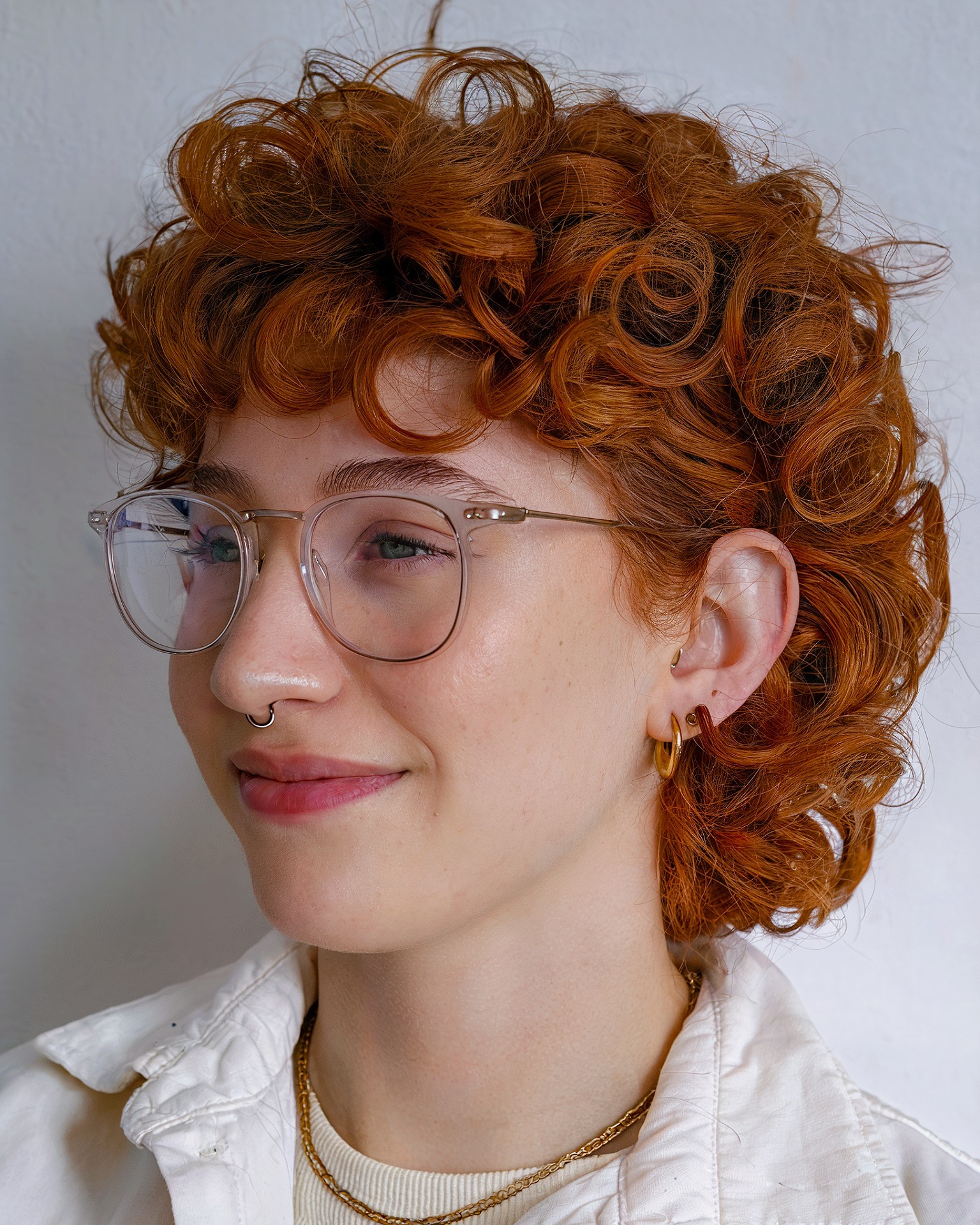 14. Firecracker Curls: Embrace the Spirited Charm Of Copper-hued Ringlets