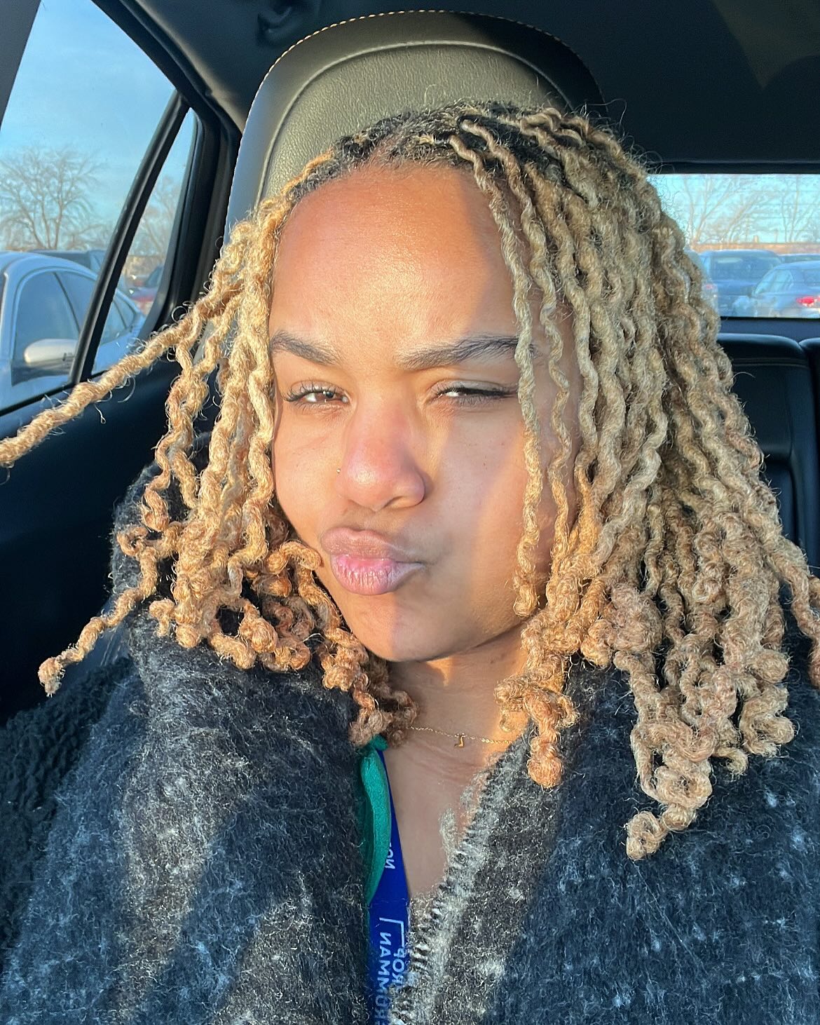 25. Sun-kissed Spiral Locks: the Ultimate Short Loc Look