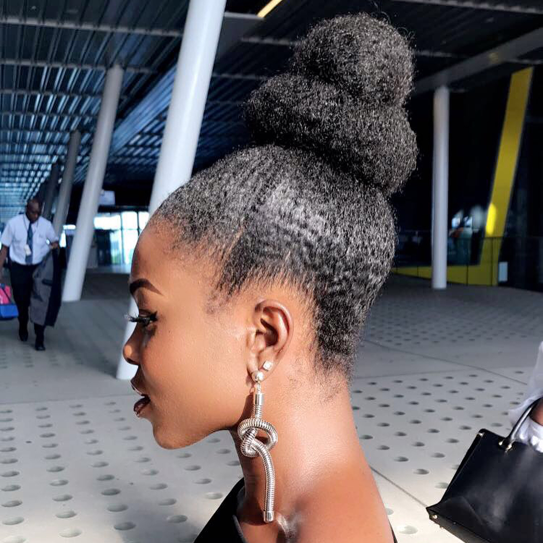 6. Cascading Curves: a Sculptural Updo for the Boldly Elegant