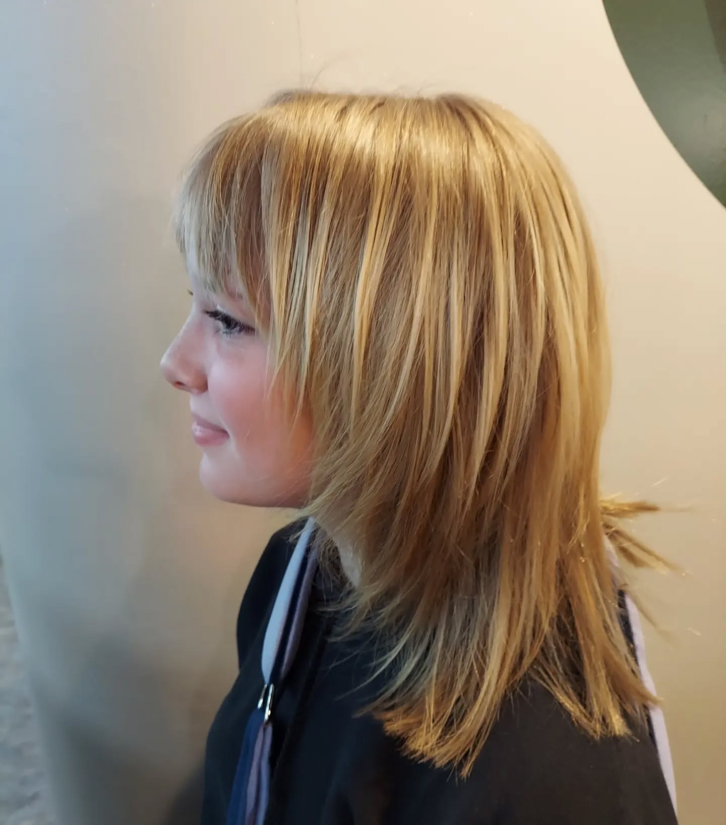 44. Golden Hour Shag: the Chic Blend Of Effortless Layers and Curtain Bangs
