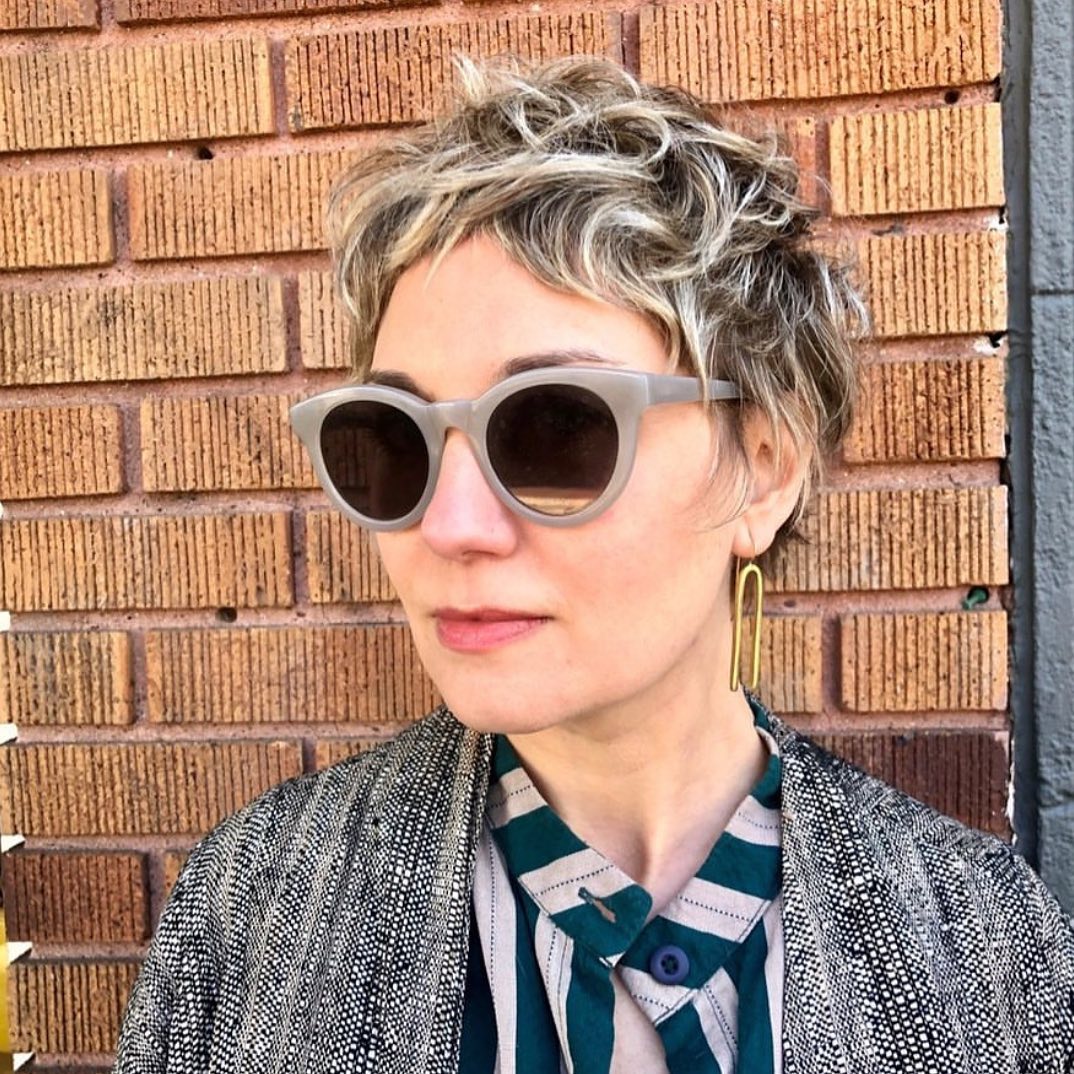 2. Short Textured Pixie Cut with Highlights