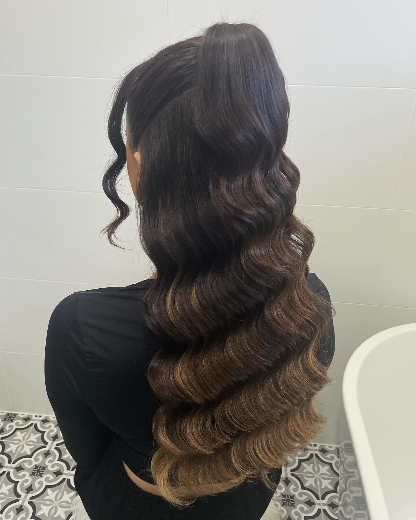 31. Vintage Glamour Reimagined: the Polished Half-high Pony with Retro Waves