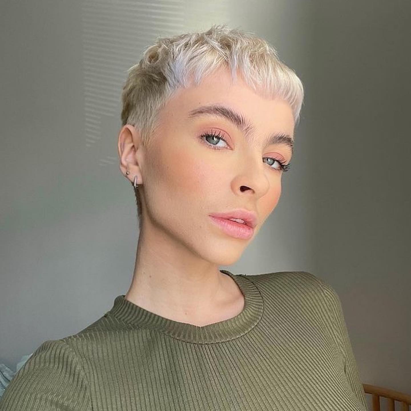 23. Short Textured Pixie Cut with Blunt Fringe