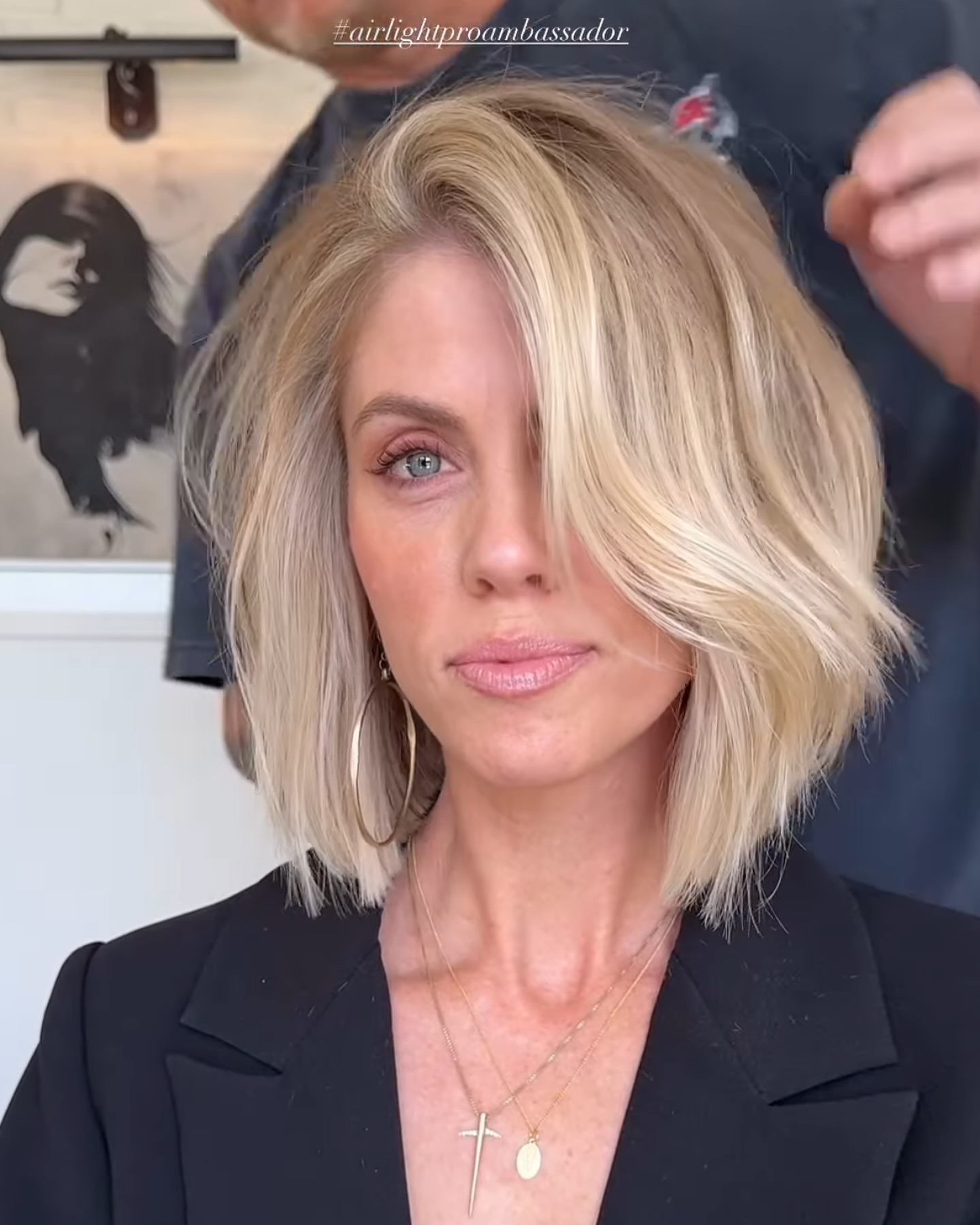 5. Textured Shoulder-length Bob with Side Swept Bangs