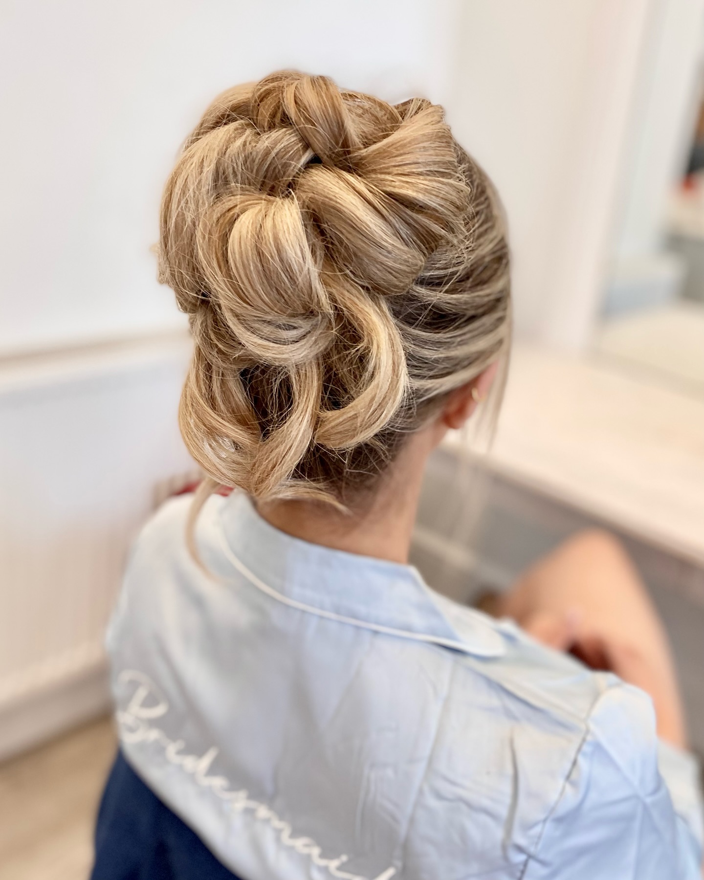 17. Braided Bliss: the Chic, Whimsical Updo for Modern Bridesmaids
