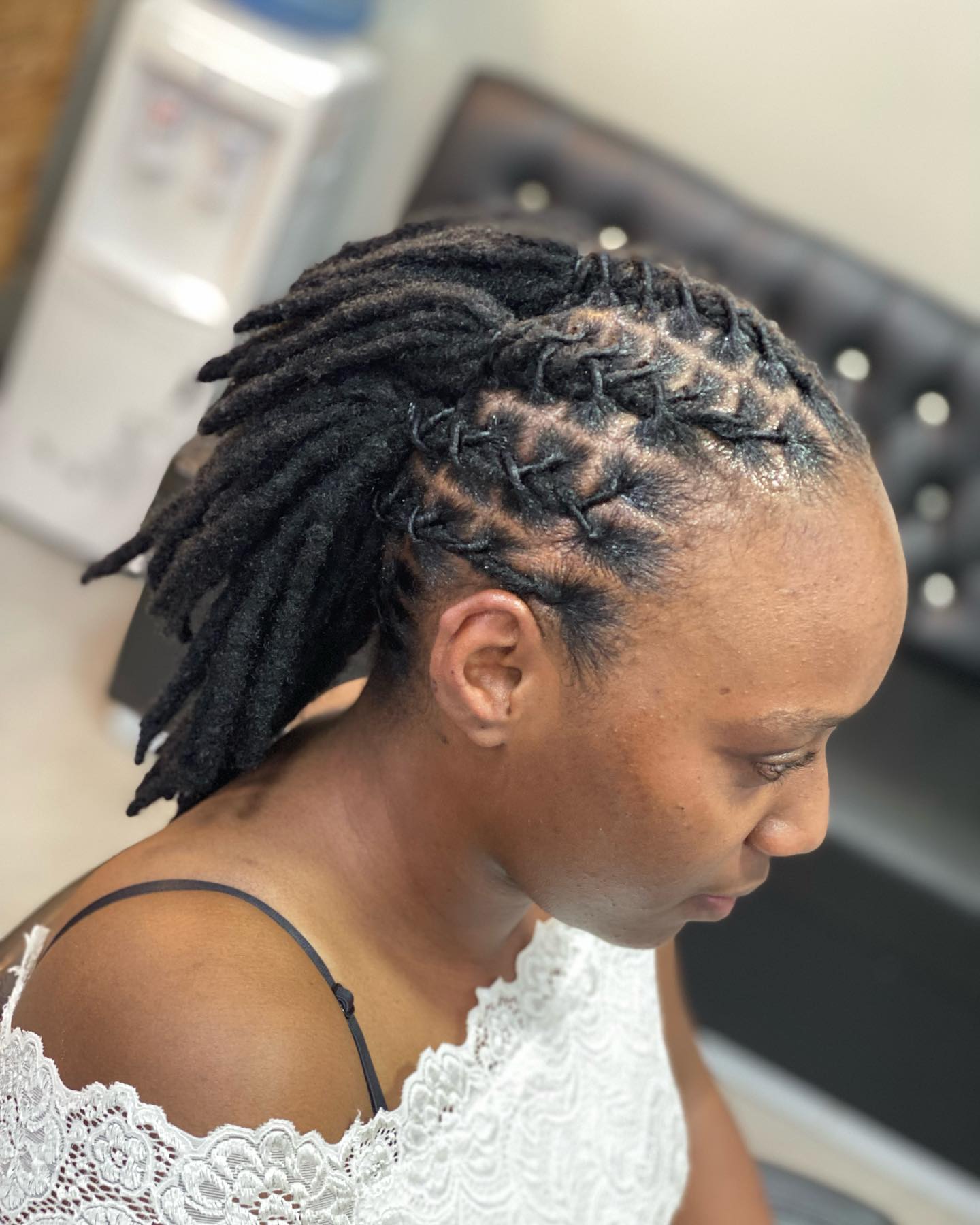 40. Cascading Crown Of Spirals: Edgy Locs with Braided Elegance