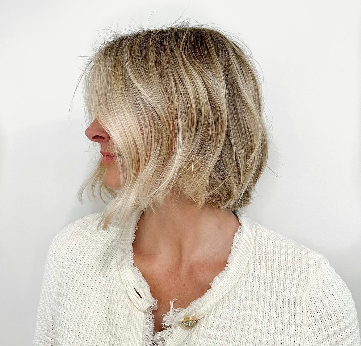 26. Breezy Elegance: the Textured Chin-length Bob with a Whisper Of Blonde