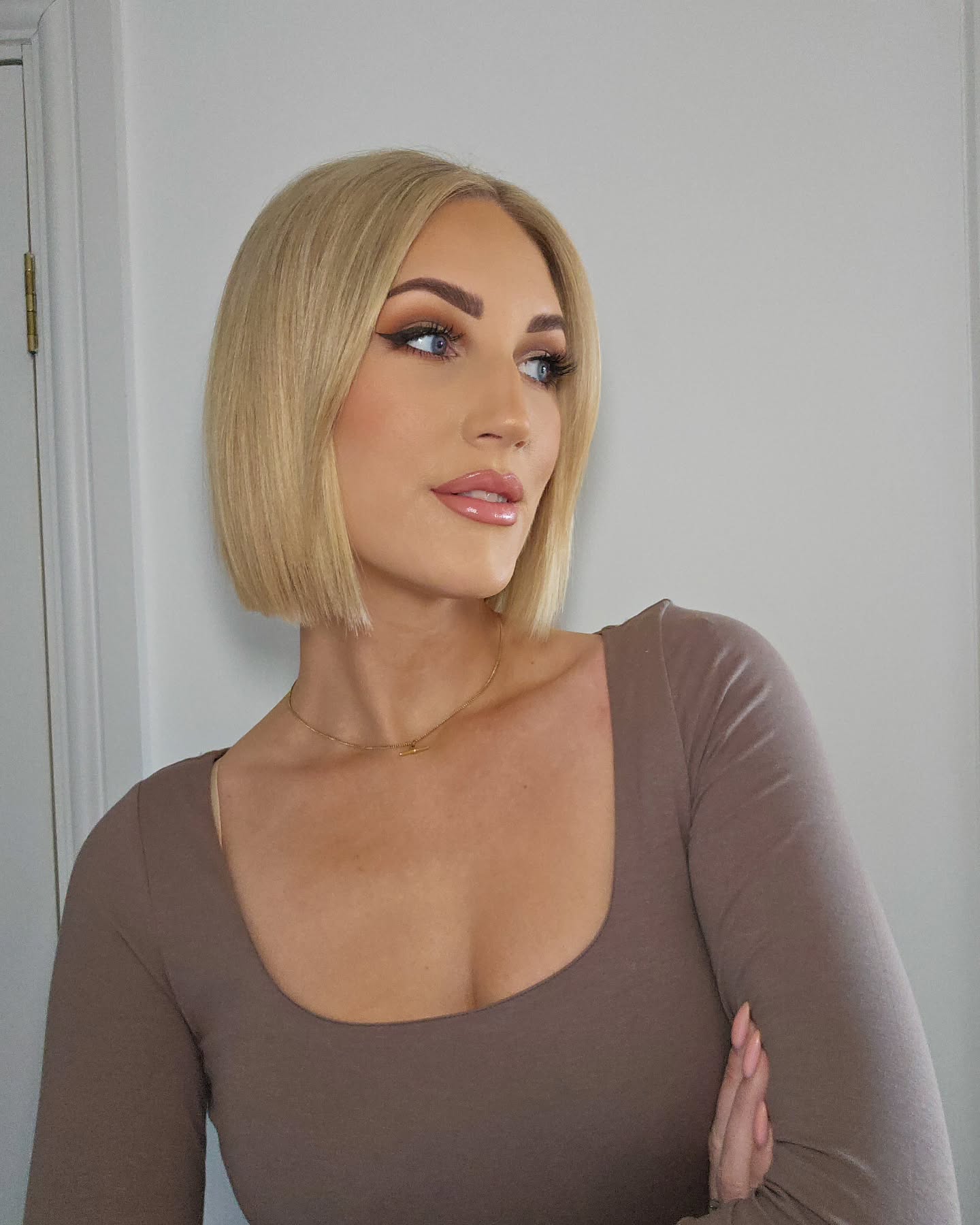 4. Straight Bob with Blunt Ends and Glossy Finish