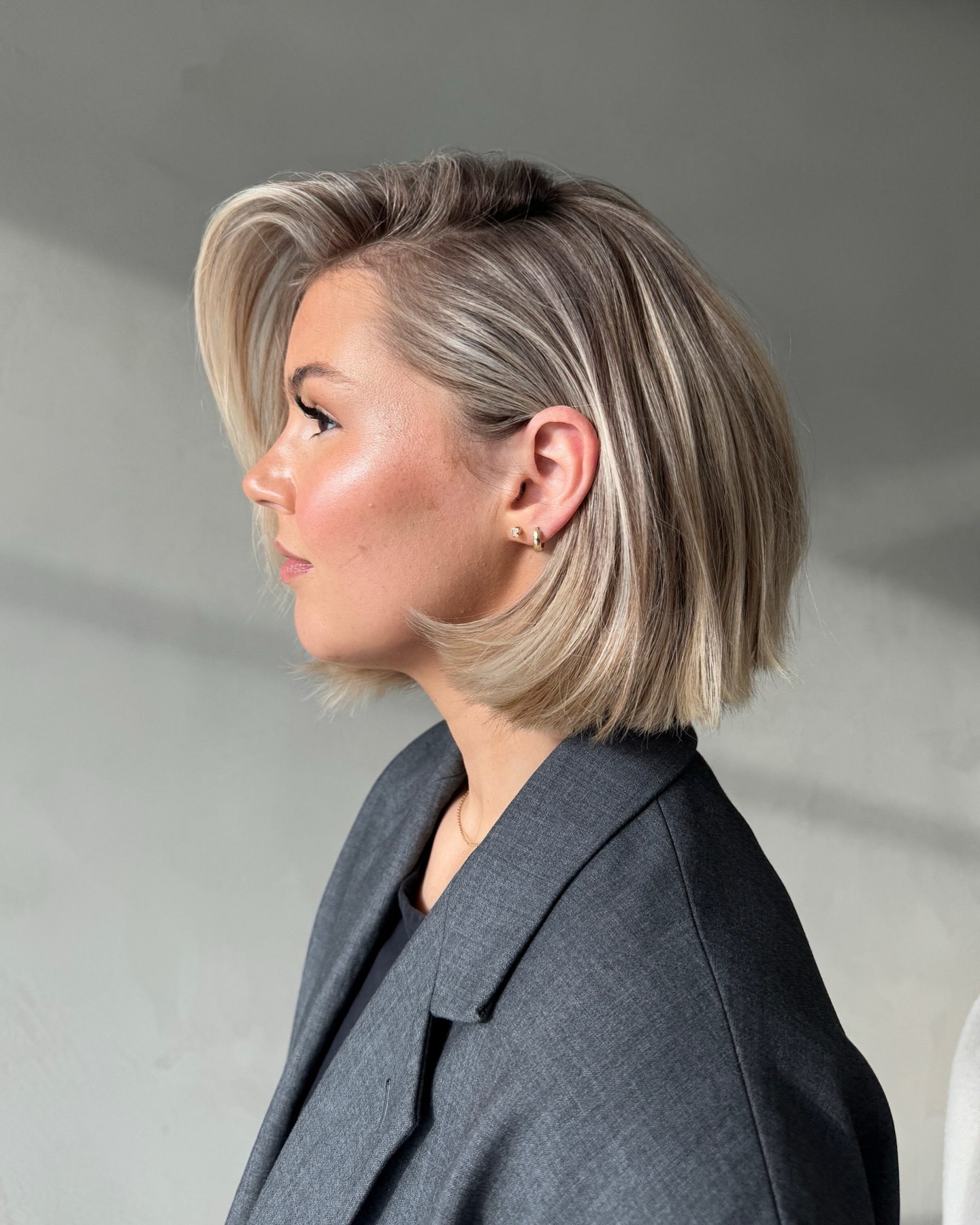 15. Sophisticated Blunt Bob with Side Part