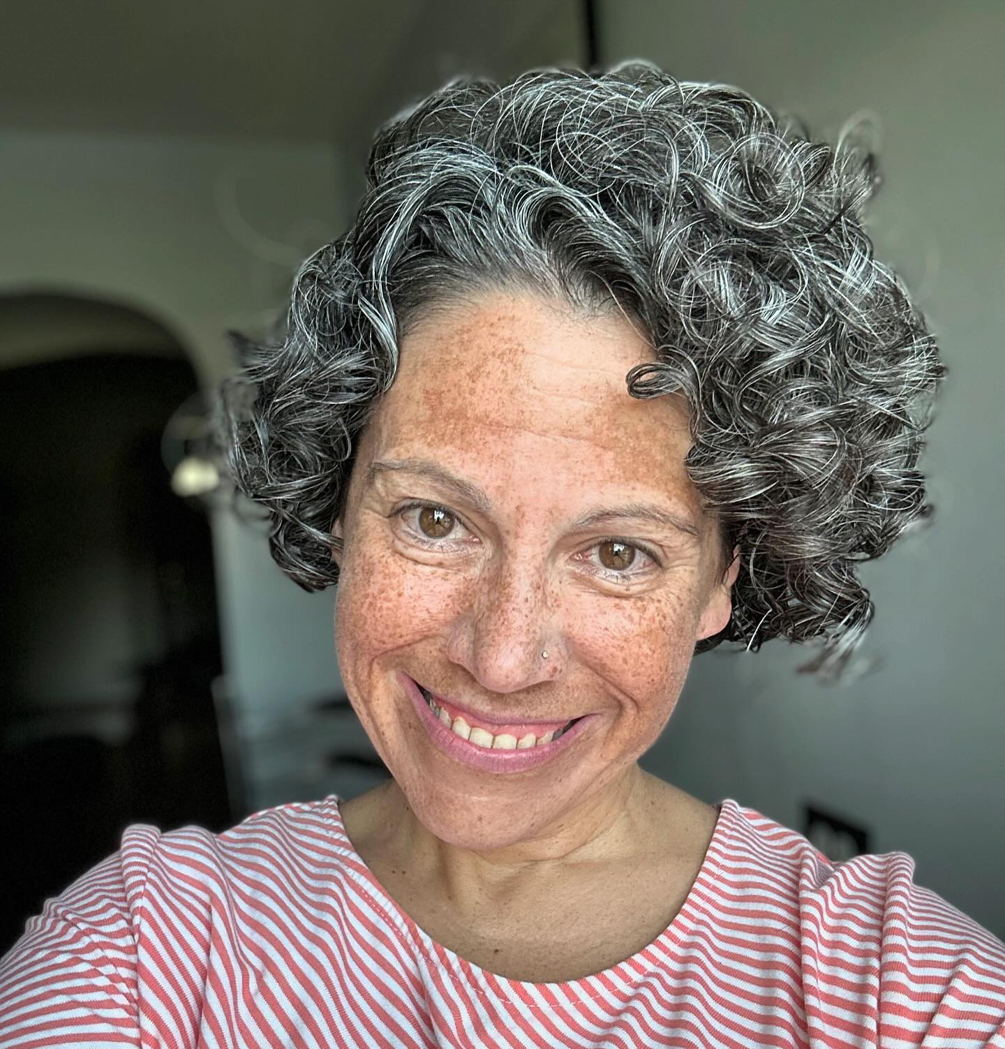 32. Curls Of Confidence: Embracing the Silver and Bold