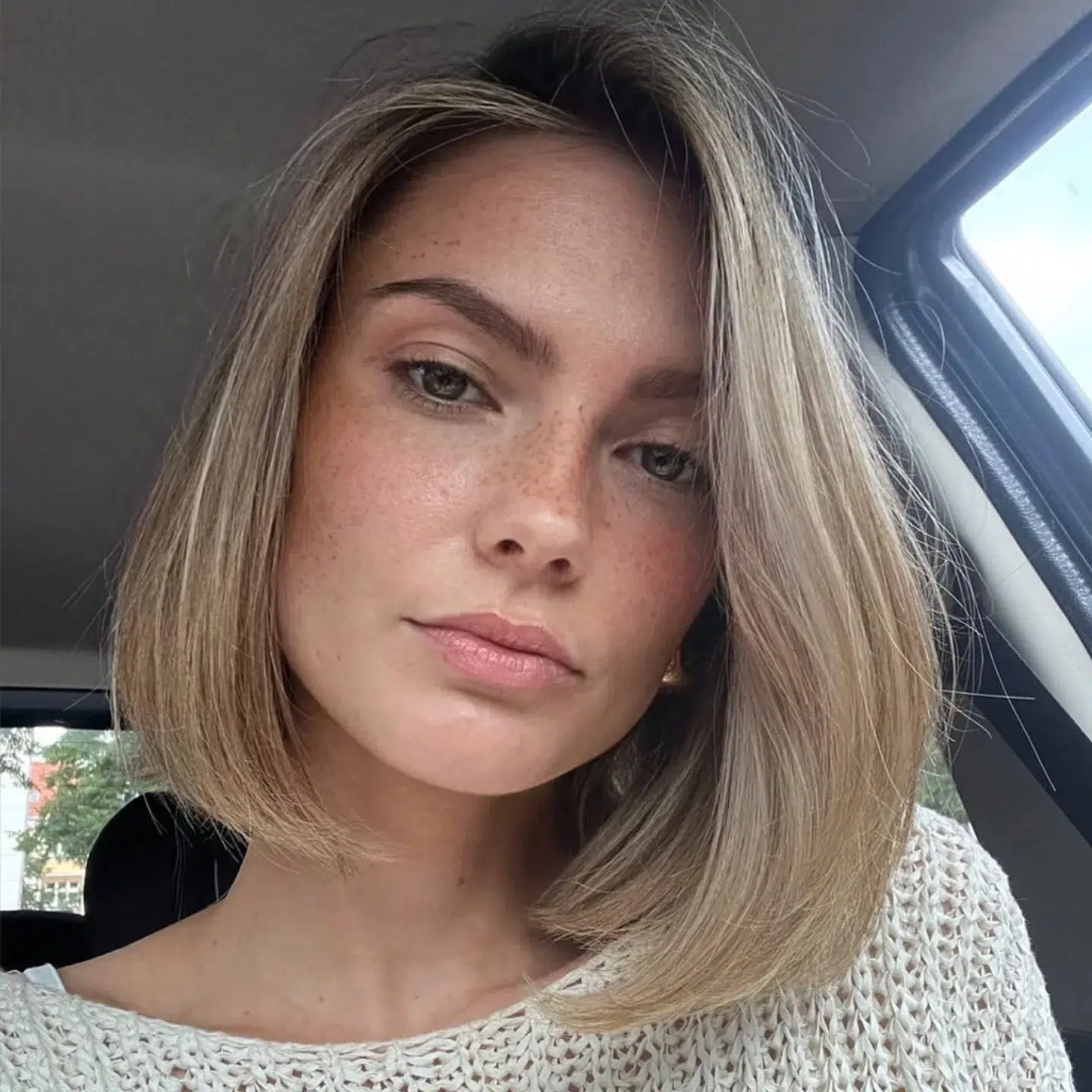 27. Smooth Blunt Bob with Side Part
