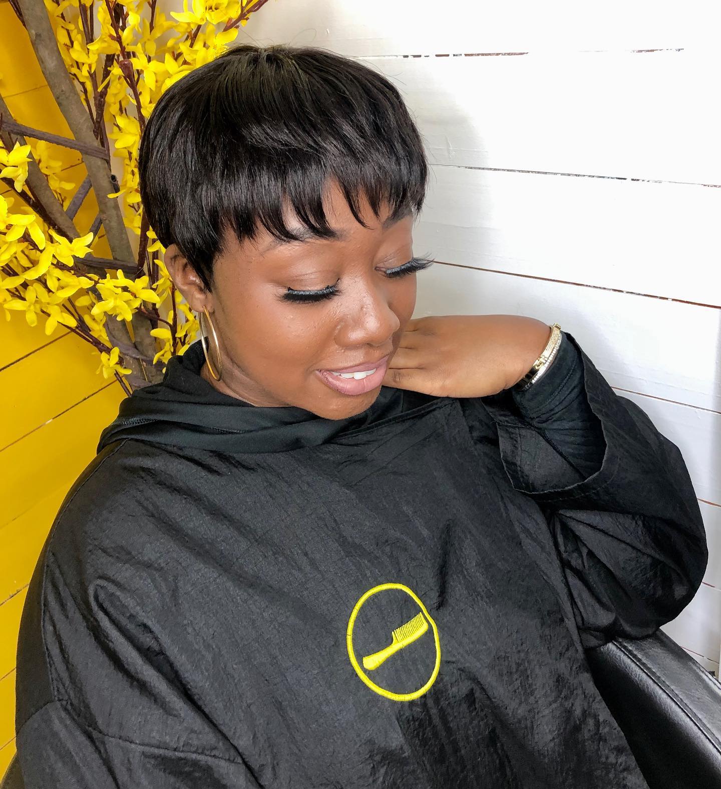 33. 90s Pixie Cut with Soft Bangs