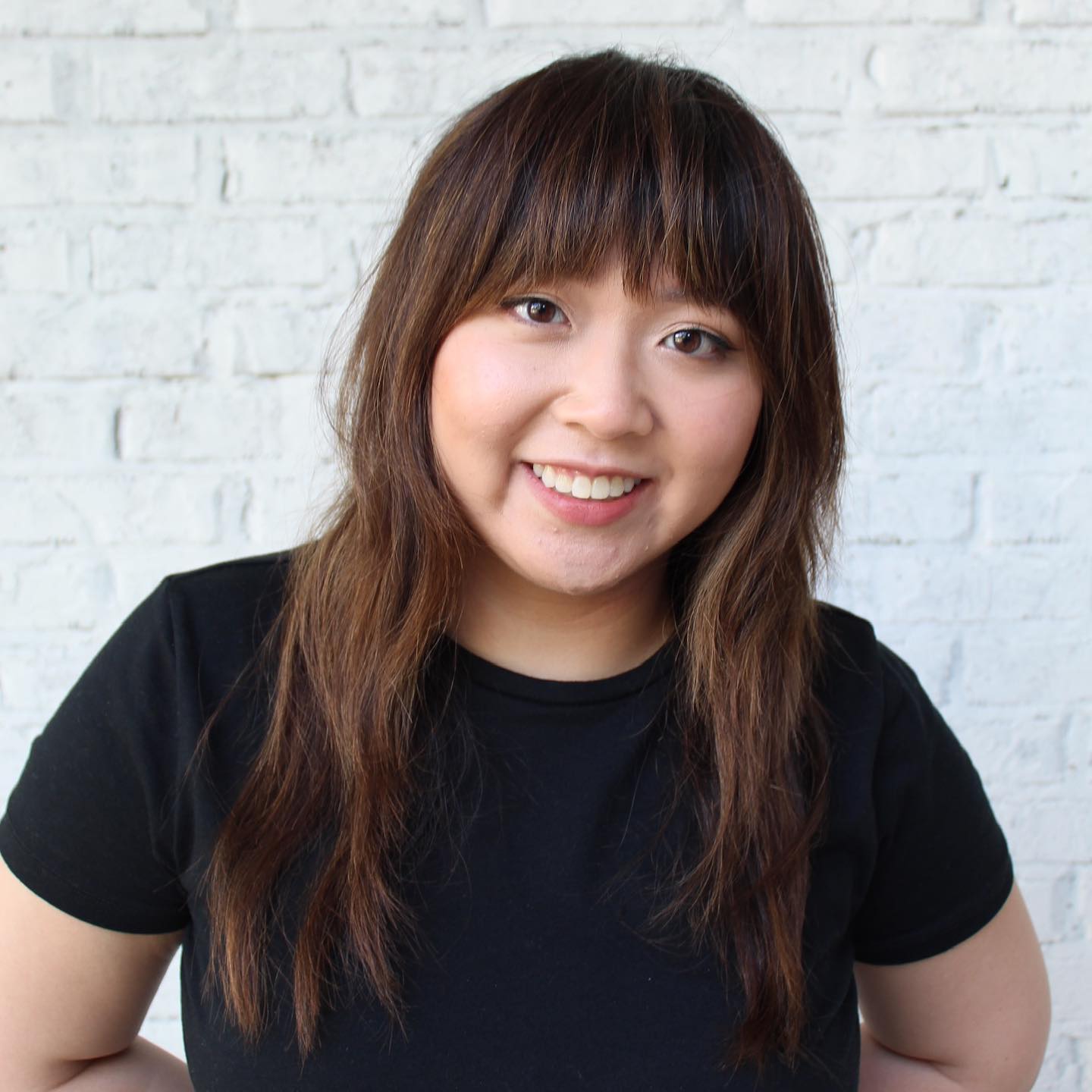 39. Chic Bedhead: Effortless Layers with a Playful Fringe