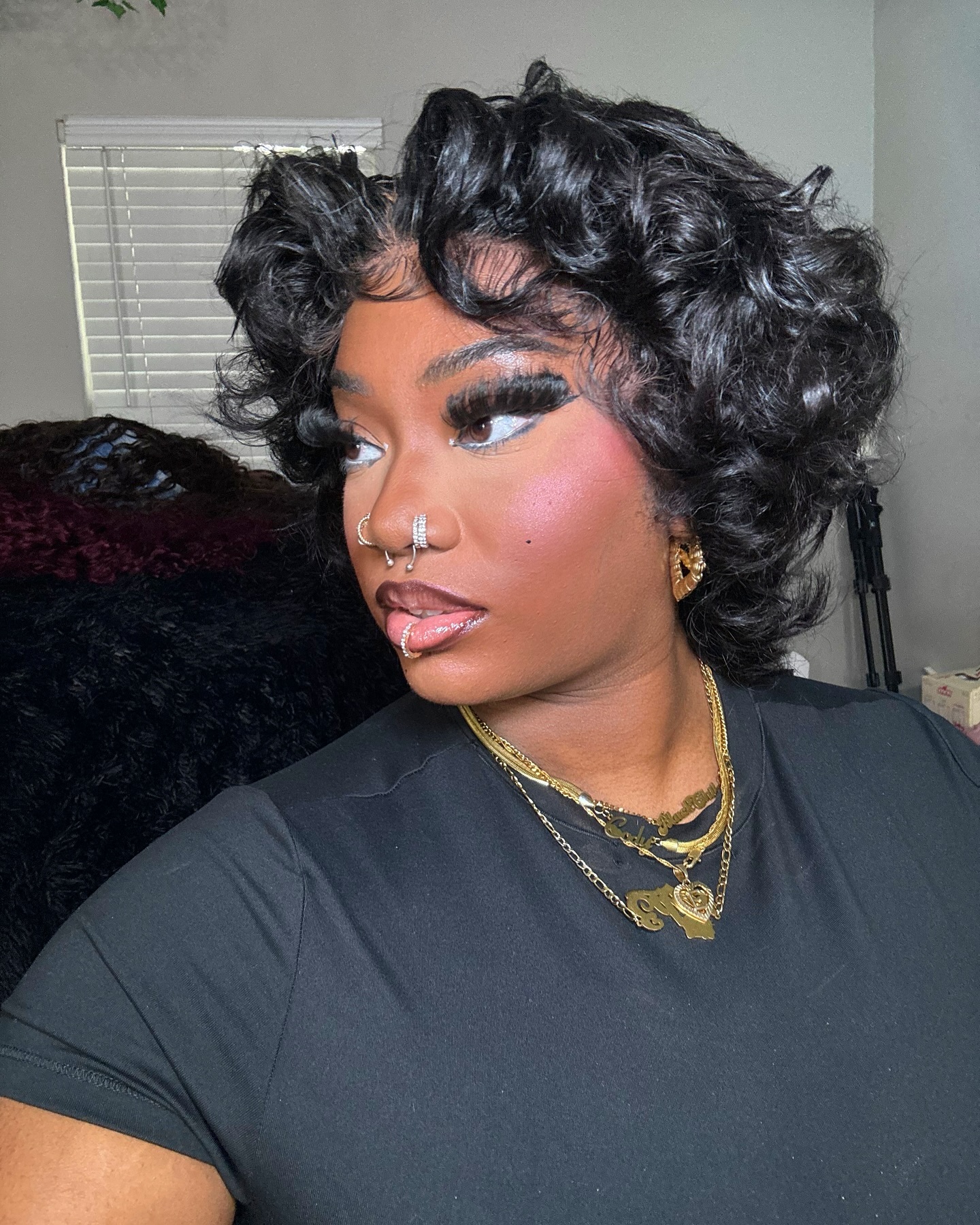 22. Crowning Glory: Effortless Elegance with Curly Bangs