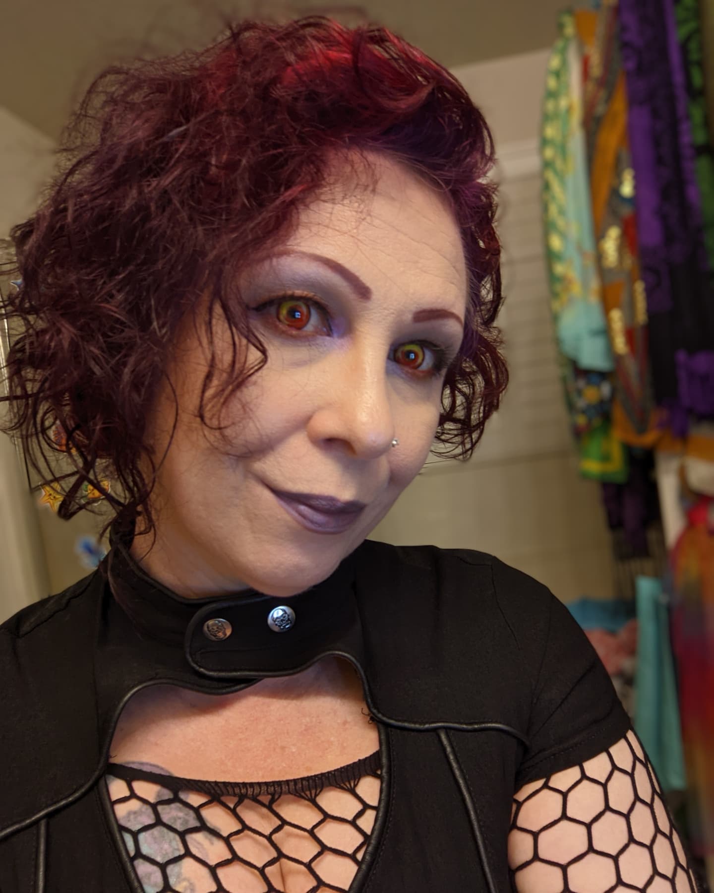 14. Unleashed Elegance: the Fierce Curly Crop with a Bold Twist