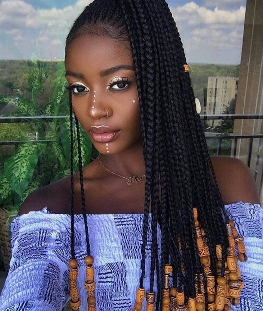 18. Ethereal Elegance: Box Braids Adorned with Natural Wood Accents