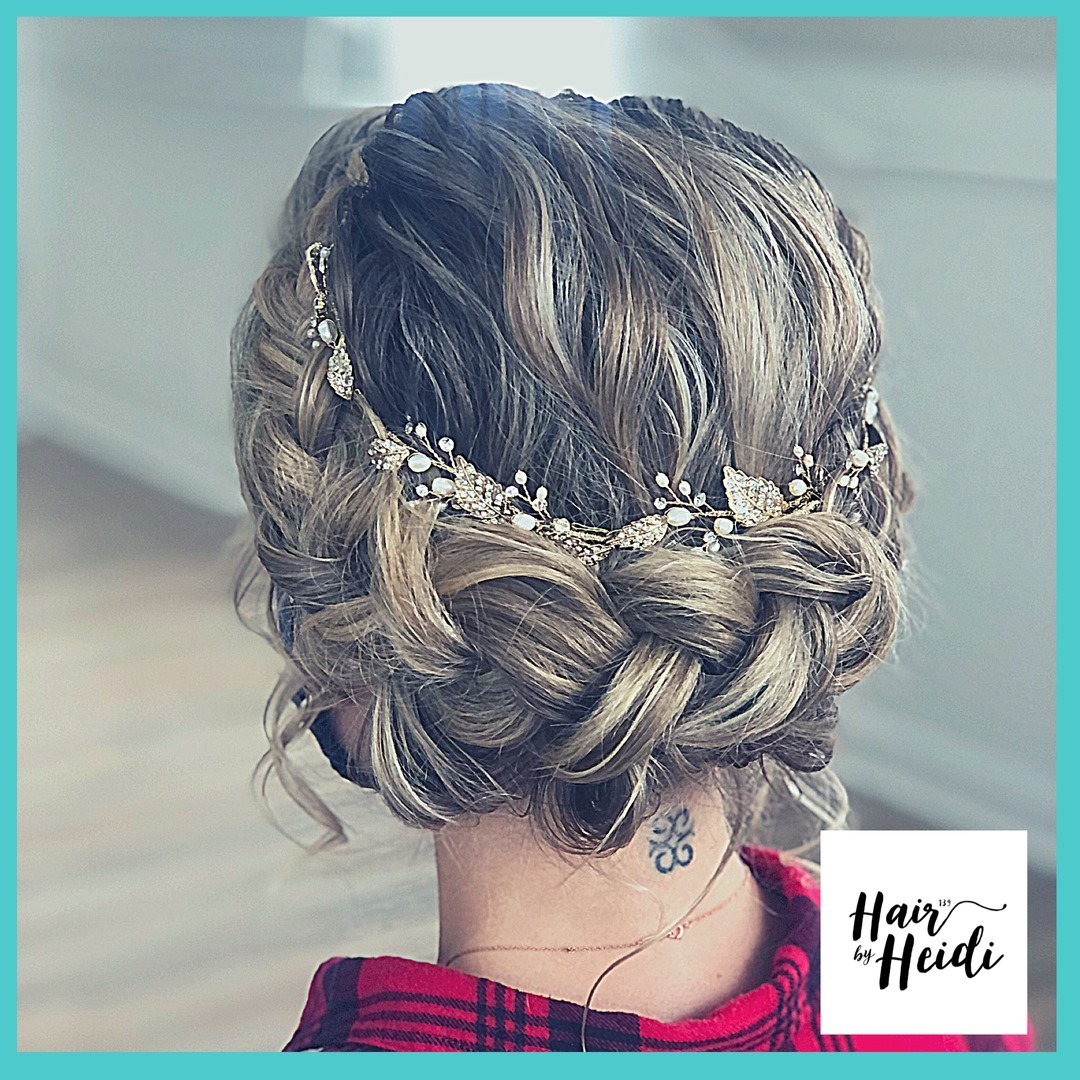 27. Gilded Garden Glam: a Braided Updo with a Touch Of Elegance
