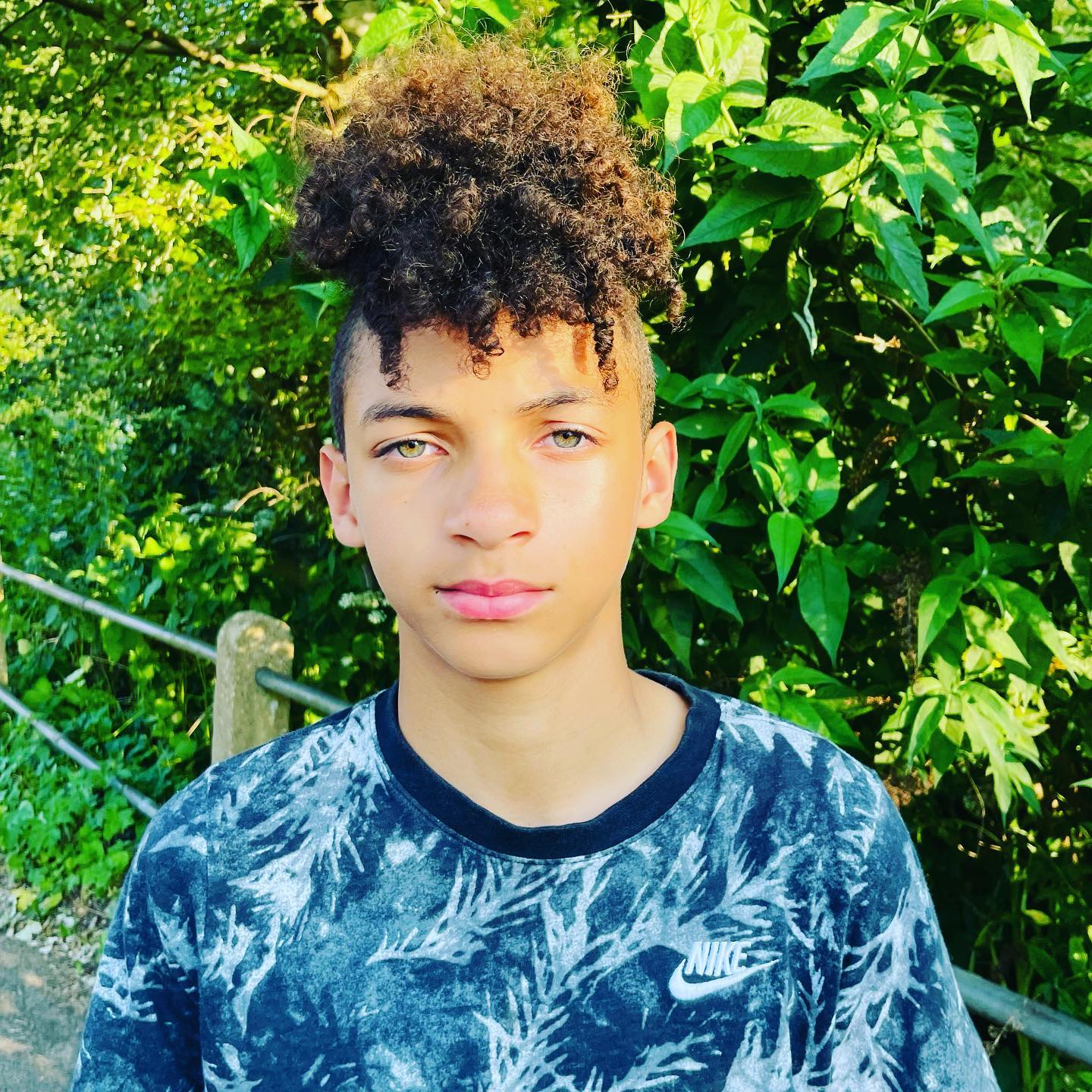32. Crown Of Curls: the Spirited Edge Of Afro Mohawk Style