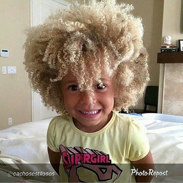 16. Blonde Mid-length Shag with Curtain Bangs