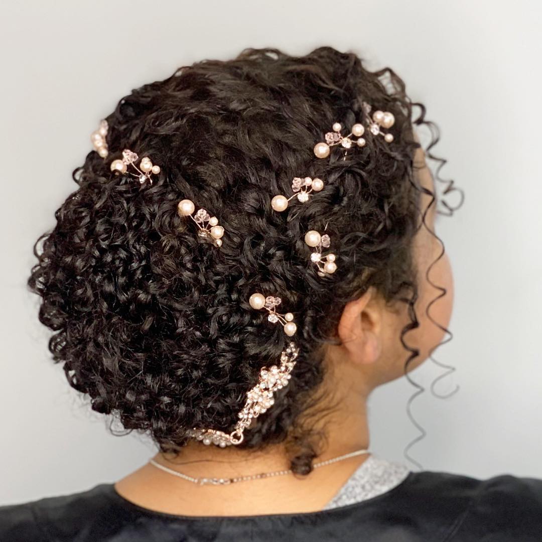 10. Whimsical Curl Cascade with Pearl Accents